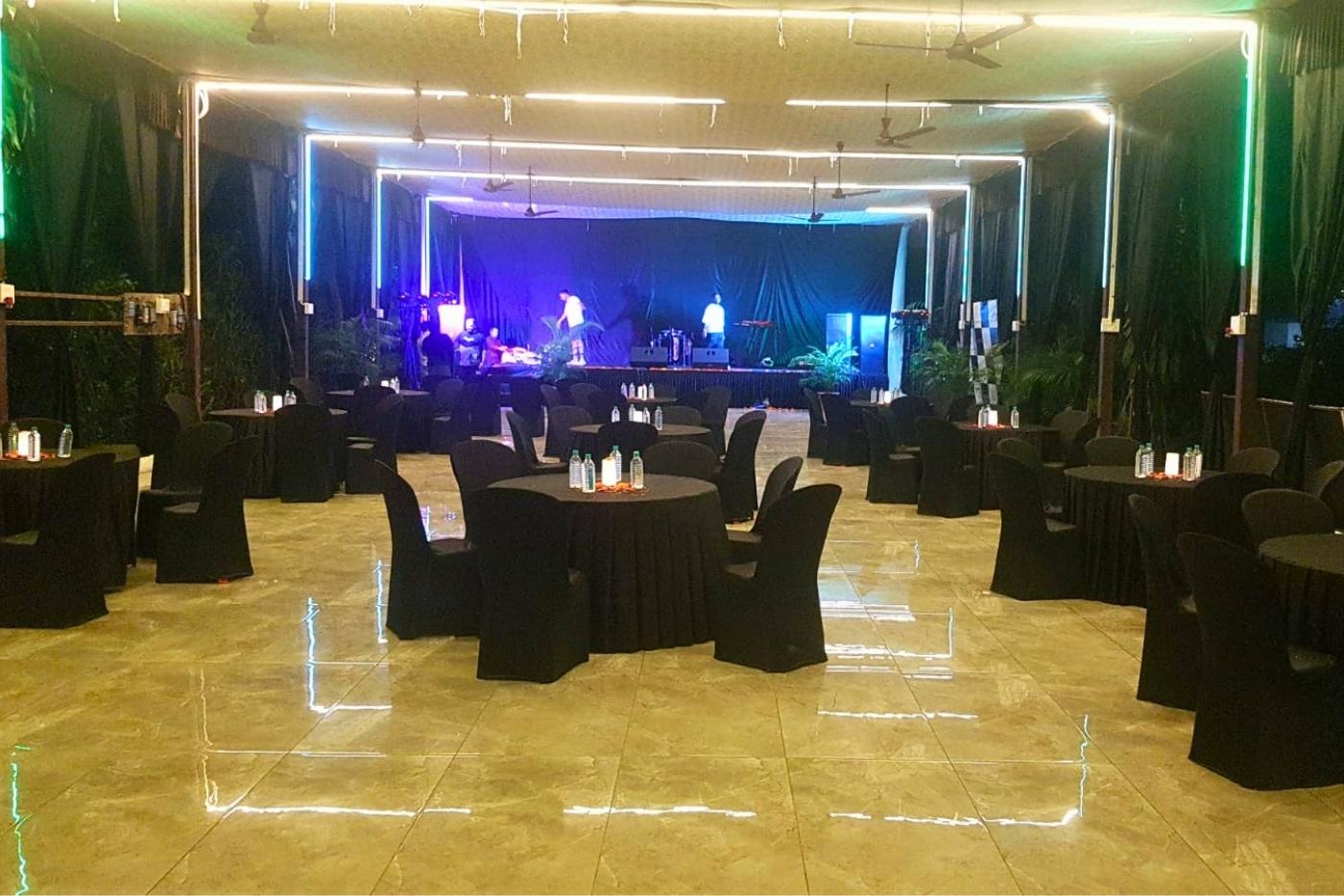 Grand banquet hall at Unwind Resort set for an evening function